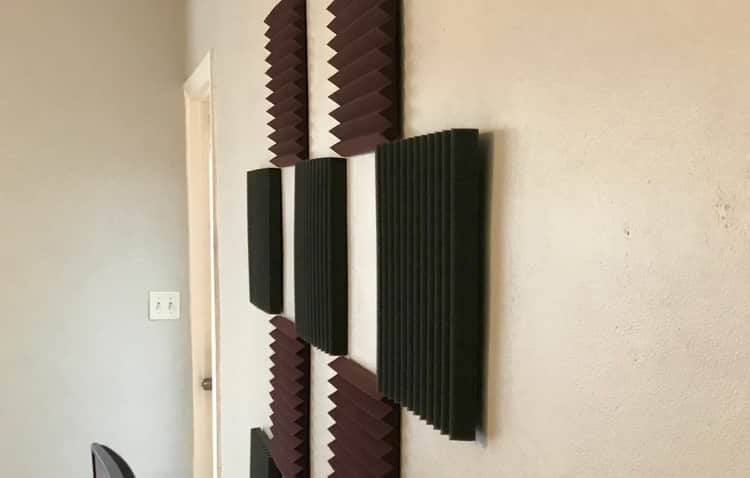 install acoustic foam panels to reduce echo